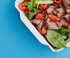 salad with beef and vegetables top view photo