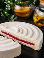 Elegant French mousse cake covered with white chocolate velour photo