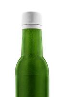 Bottle of healthy green smoothie on white photo