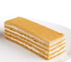 Napoleon slice cake of puff pastry with cream photo