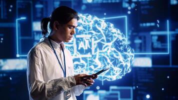 Focused technician in data center using artificial intelligence computing simulating human brain thought processes. Server room employee works on tablet with AI machine learning algorithms photo