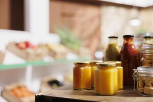 Close up shot of products sold in bulk in zero waste store to minimize plastic usage for a sustainable lifestyle. Bio pantry staples ready to be bought by consciously living clients photo