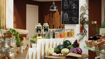 Bulk products supermarket with pesticides free fruits, vegetables, grains, spices and pasta on display. Empty eco friendly local grocery store with net zero carbon dioxide emissions photo