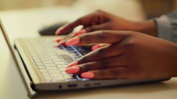 Freelancer typing new story details on online blog, self employed woman at home office. African american person working on freelancing and blogging, writing modern articles. Handheld shot. Close up. photo