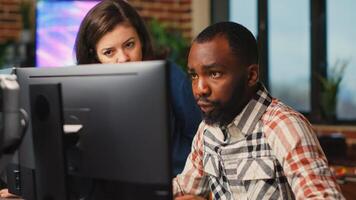 Diverse team of employees working on software development with manufacturing interface, infographics. IT engineers brainstorming ideas to develop production with artificial intelligence. photo