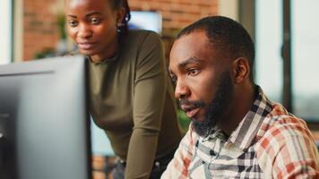 African american team of engineers working with 3d modelling software, brainstorming new ideas. Man and woman colleagues using artificial intelligence to create digital project at job. photo