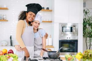 couple woman lover LGBT friend living with love care cooking at home holiday activity together photo