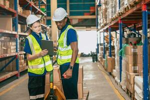 warehouse worker couple team friend working together supervisor help support problem at work photo