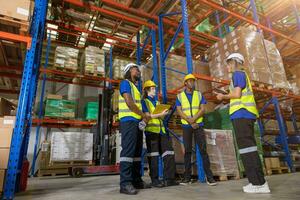 group of people worker in warehouse cargo storage meeting talking together work discussion with foreman manager for planning teamwork working photo