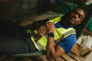 Lazy alcoholic worker male sleep during work hours photo