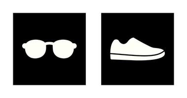 Gafas de sol y zapato icono vector