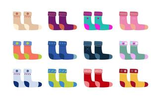 Adults and kids colored socks set. Warm textiles. Vector fabric.