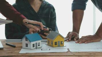 Architects, engineers and homeowners meeting at construction site video