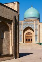 Tashkent, Uzbekistan-august 11, 2023-View of the Hazrati Imam complex during a sunny day.The complex is a square that includes a set of religious buildings in Tashkent photo