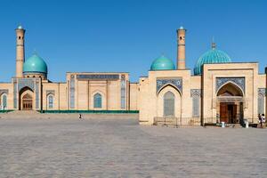Tashkent, Uzbekistan-august 11, 2023-people visit the Hazrati Imam complex during a sunny day.The complex is a square that includes a set of religious buildings in Tashkent photo