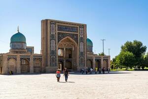 Tashkent, Uzbekistan-august 11, 2023-people visit the Hazrati Imam complex during a sunny day.The complex is a square that includes a set of religious buildings in Tashkent photo