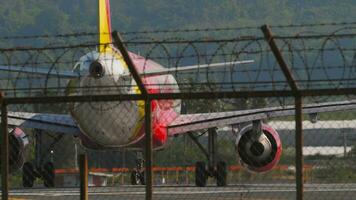 PHUKET, THAILAND FEBRUARY 10, 2023 - Airbus A320 Airplane of Vietjet Air on runway of Phuket International Airport video