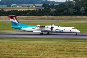 Luxair passenger plane at airport. Schedule flight travel. Aviation and aircraft. Air transport. Global international transportation. Fly and flying. photo