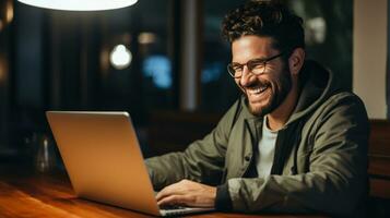 Man Surfing the Web on a laptop photo