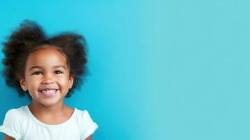 Back to School. Happy Young Girl on a Blue photo