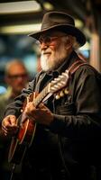 musician plays guitar on the street among a crowd of people photo