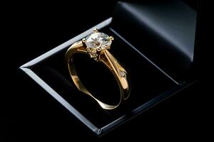 A shiny gold ring resting on a sleek black box. AI Generated photo