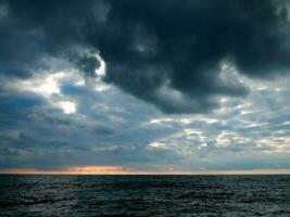 Beautiful evening cloudscape over the sea photo