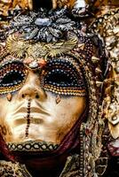 An ornate mask for carnival in Venice photo