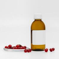 Cosmetic brown glass bottle and cranberry on white background. Background for cosmetic product branding, corporate identity and packaging inspiration. Mockup photo