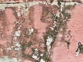 Old plaster walls painted red photo