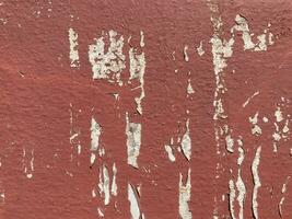 Old plaster walls painted red. photo