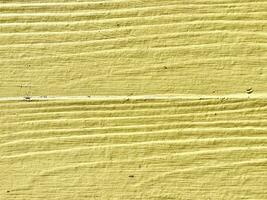 amarillo antiguo de madera pared textura. foto