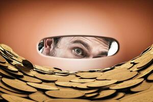 Astonished man looks inside the piggy bank with a magnifying photo