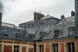 Typical building facade of a hausmanian building in Paris. photo