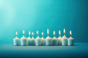 Birthday candles on blue background. Shallow depth of field, Happy birthday candles on blue background with copy space for text, AI Generated photo