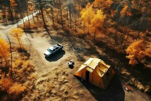 A large tourist tent stands in the middle of the forest in sunny autumn weather. There is a car next to the tent. Drone view. AI Generative photo