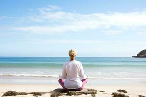 AI Generative. An elderly woman does yoga on the beach. Woman sitting on the sand with her back to the camera. Horizontal photo