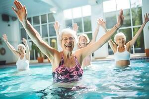 Elderly happy women do aqua aerobics in the indoor pool. Women look at the instructor and repeat the exercises. AI Generative photo