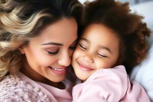 Mixed race mother and daughter in pink clothes lie in bed and hug.  AI Generative photo
