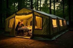 A large tourist tent is lit by lanterns in the evening in the forest. Inside the tent, people are having dinner at the table. AI Generative photo