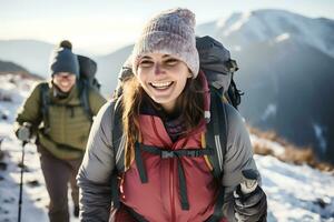 AI Generative. Couple of tourists in ski suits are climbing up at snow-covered mountain trail against the backdrop of a beautiful winter mountain landscape. photo