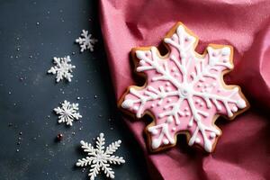 AI generative. Christmas cookies in the shape of a pink snowflake photo