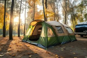 un grande turista tienda soportes en un césped en el medio de un bosque en otoño Mañana soleado clima. ai generativo foto