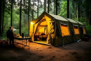 A large tourist tent is lit by lanterns in the evening in the forest. There are people near the tent and they are preparing dinner.  AI Generative photo