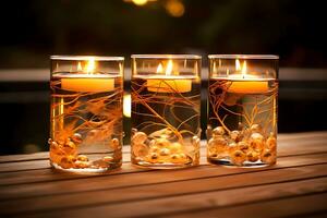 Three burning candles float in rectangular glasses with golden-colored decor.. AI Generative photo