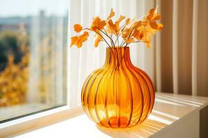 AI Generative. A glass vase in the shape of an orange pumpkin stands on a windowsill illuminated by the sun's rays. Horizontal photo