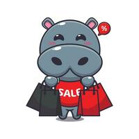 cute hippo with shopping bag in black friday sale cartoon vector illustration