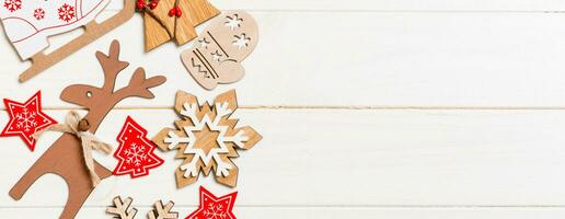 Top view of Banner Christmas decorations and toys on wooden background. Copy space. Empty place for your design. New Year concept photo