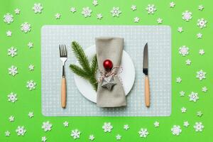 Christmas dinner background with rustic decorations and kitchen utensil . View from above photo