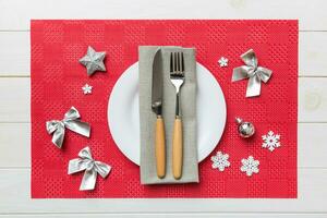 Christmas dinner background with rustic decorations and kitchen utensil . View from above photo